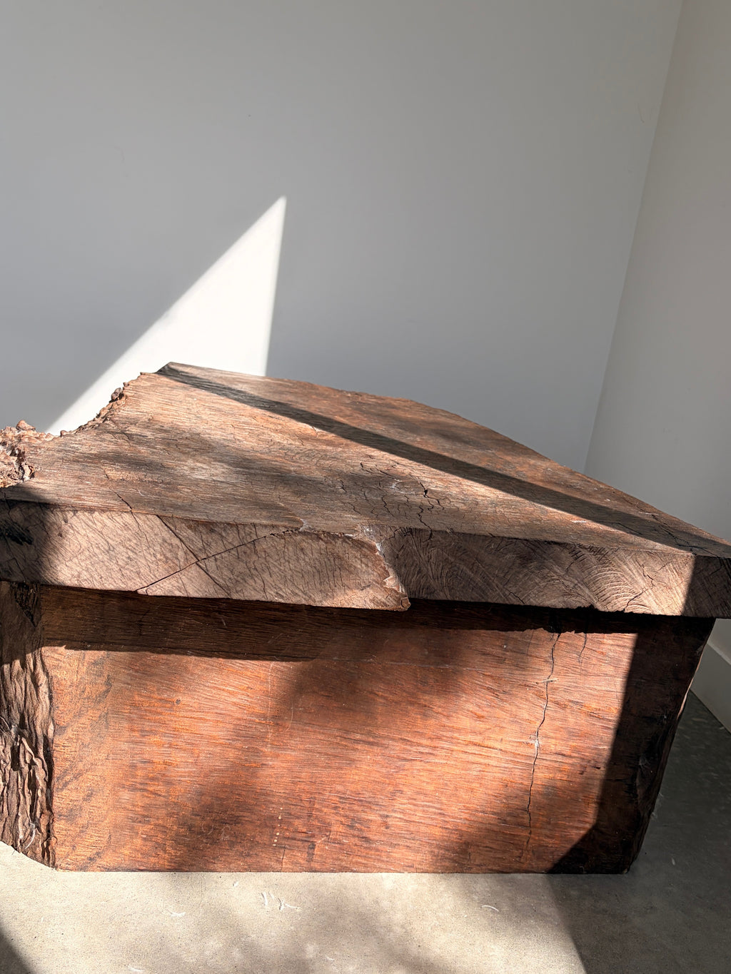 Raw live edge timber coffee table side angle view