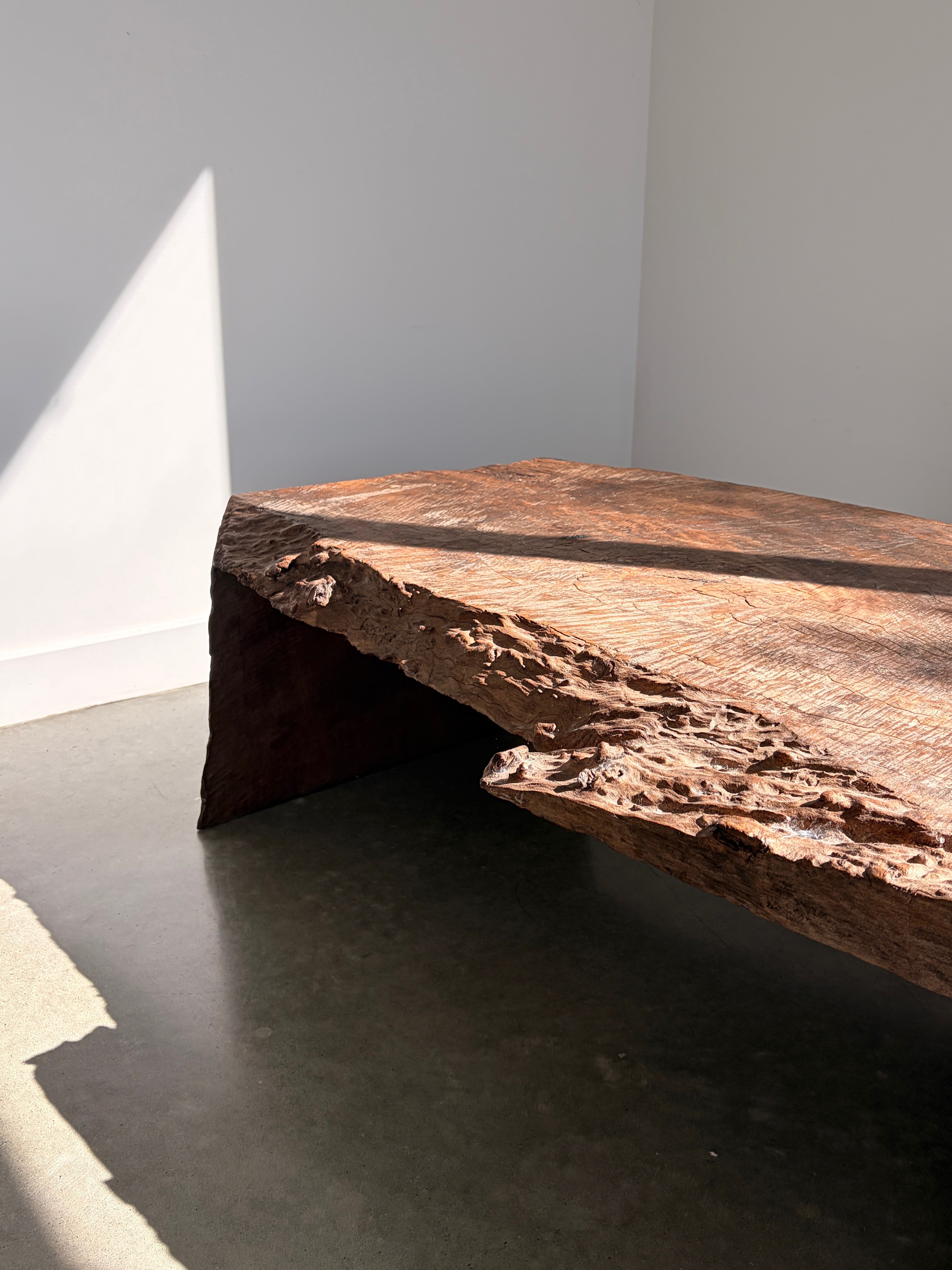 Raw live edge timber coffee table front view showing raw edges