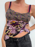 Close view of contrasting geometric and abstract prints on camisole